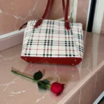 Bottom view of classic checkered white tote handbag