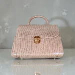 Glossy beige croc handbag front and bottom view