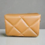 Back view of camel quilted quilted handbag without pearl chain