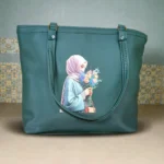Front view of deep green leather tote bag with floral printed design