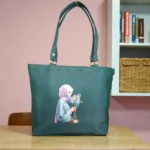 Deep green printed ladies tote bag with floral artwork and long shoulder handles