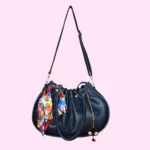 Navy blue drawstring handbag with long adjustable shoulder strap