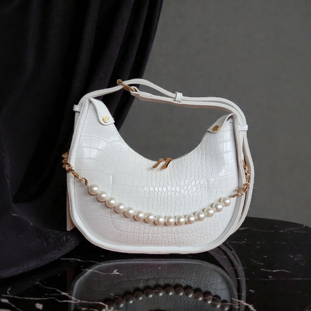 Textured pearl detail crossbody bag white front view