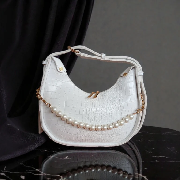 Textured pearl detail crossbody bag white front view