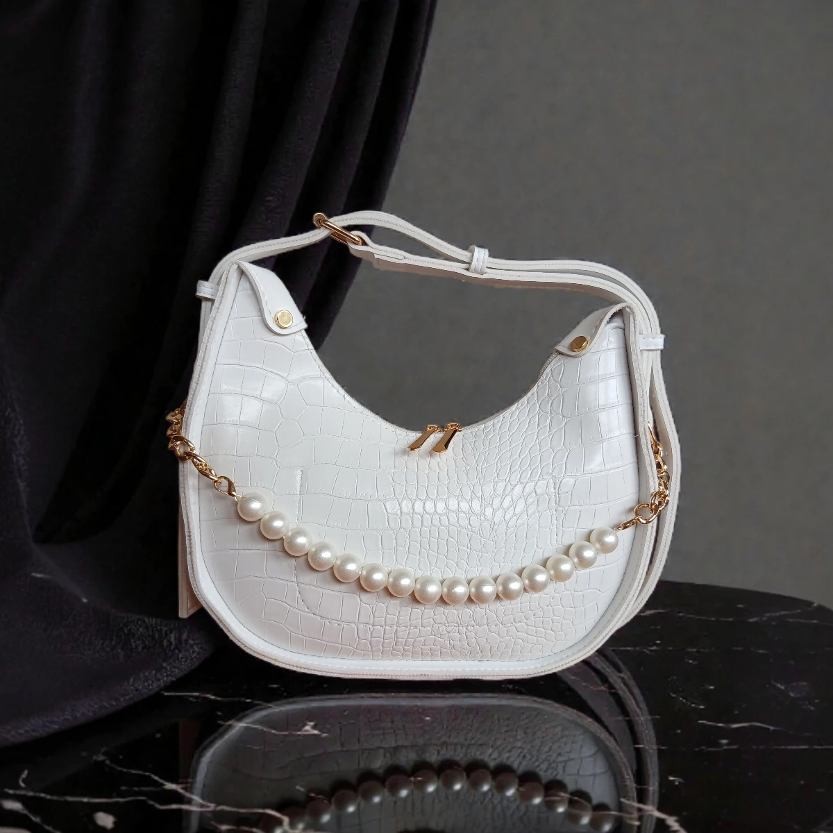 Textured pearl detail crossbody bag white front view