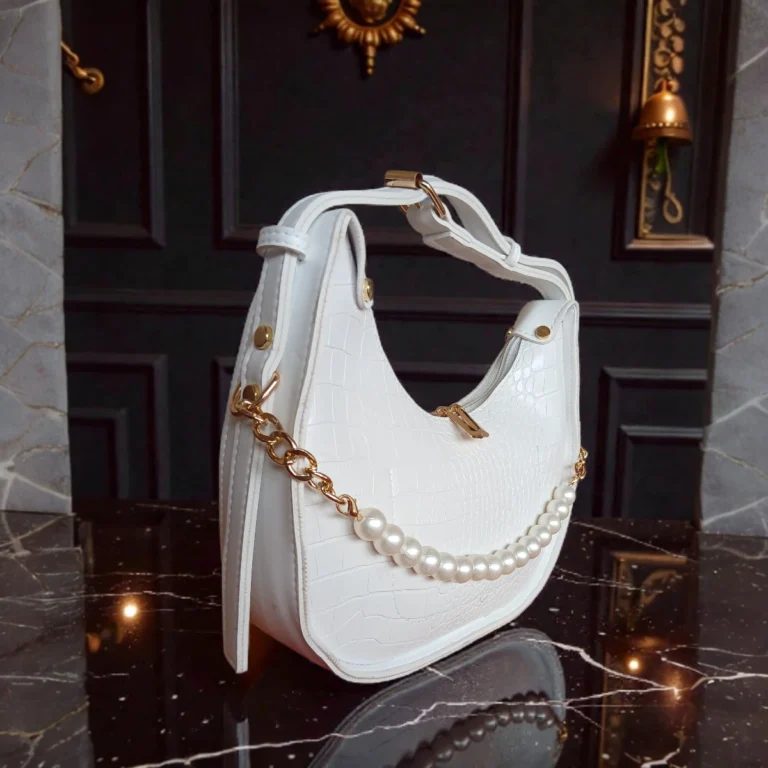 White textured crossbody bag side angle with pearl chain