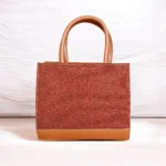 Brown tweed crossbody handbag back view on white background