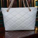 Pearl White quilted leather tote bag with gold chain straps front view showing diamond stitched pattern