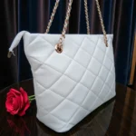 Close angle front view of Classic Quilted Chain Strap Tote Bag Pearl White highlighting diamond quilt texture and gold chain detail