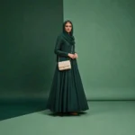 Ivory white embossed grid leather flap chain crossbody bag worn crossbody by model showing styling and size