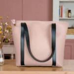 Minimal Contrast Strap Tote Handbag Blush Pink front view with black contrast straps