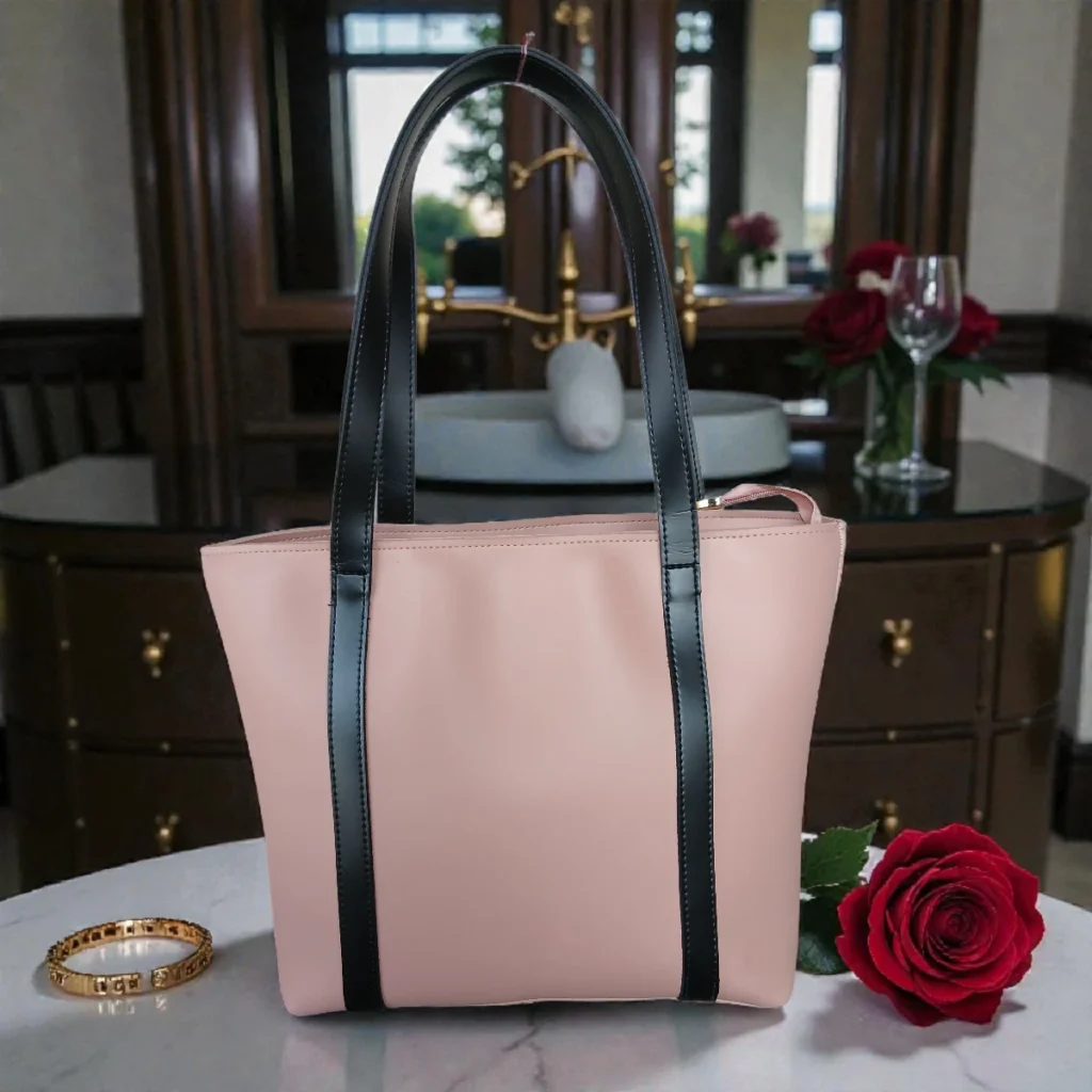 Minimal Contrast Strap Tote Handbag – Blush Pink front view with black straps on marble table