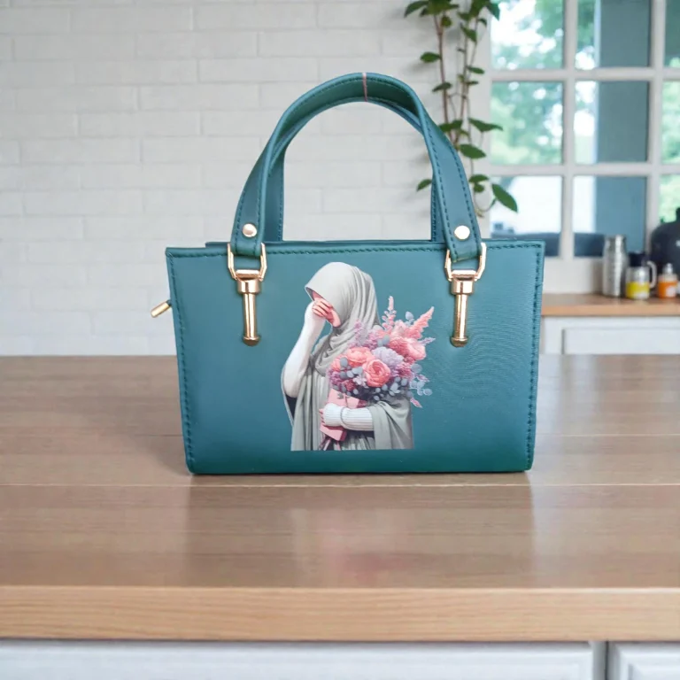 Printed Portrait Mini Structured Top Handle Crossbody Emerald Green front display with floral props showing mini structured handbag design