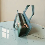 Printed Portrait Mini Structured Top Handle Crossbody Emerald Green side view showing dual compartments zipper closure and gold hardware details